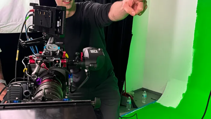 Corey Behrens directing the video crew while planning a corporate shoot