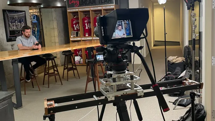 Executive delivering a company update on a live-stream production for internal communications