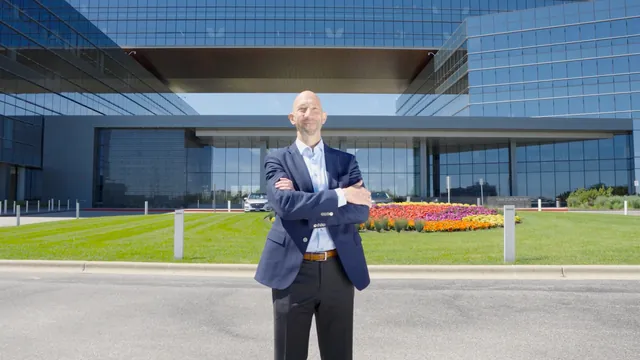 Wheels CEO on camera in front of the company's new Schaumburg office