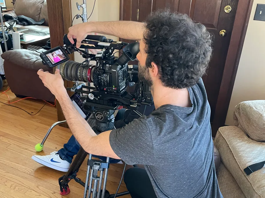 Documentary camera crew on a B2B corporate video production shoot